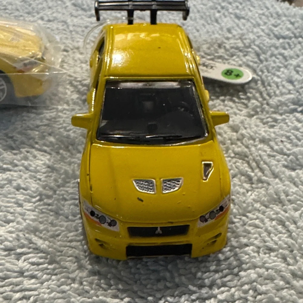 NWT ERTL Collectibles 2002 Mitsubishi Lancer Evolution Die Cast Model set of 2
